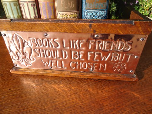 Arts & Crafts oak book stand with motto