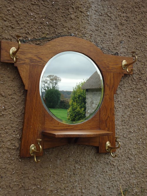 Arts & Crafts oak hall mirror with hooks