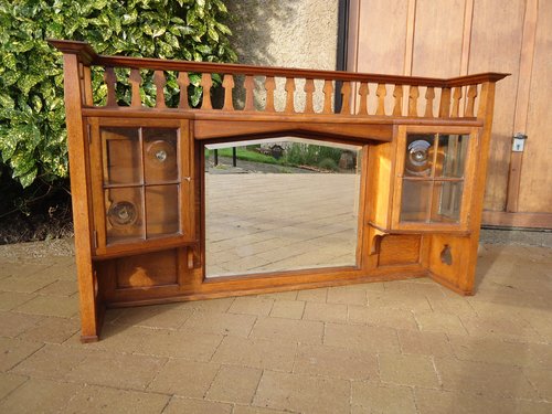 Stuning Arts & Crafts oak overmantle with cupboard