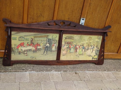 Arts & Crafts oak overmantle with prints