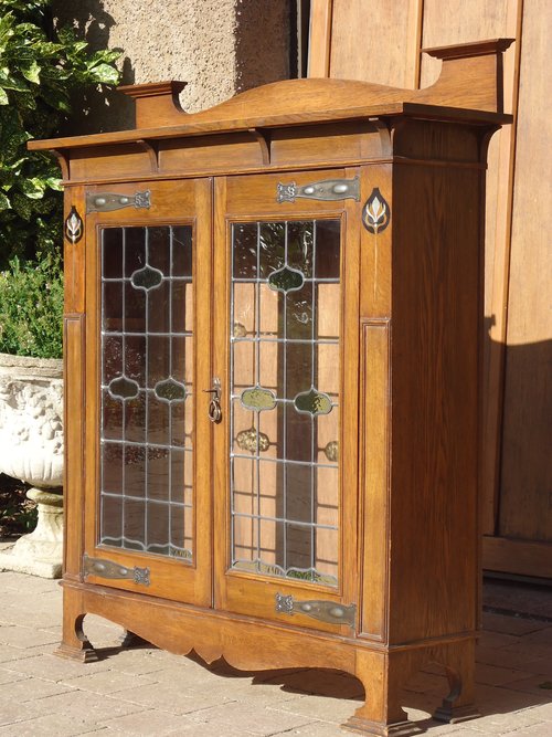 Arts & Crafts oak two door glazed bookcase