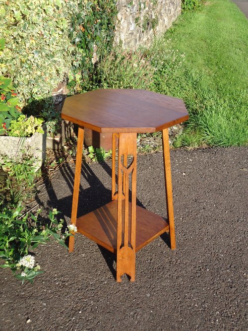 Arts & Crafts octagonal oak table with pierced hearts