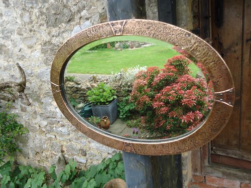 Arts & Crafts oval copper mirror