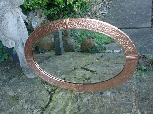 Arts & Crafts oval copper mirror