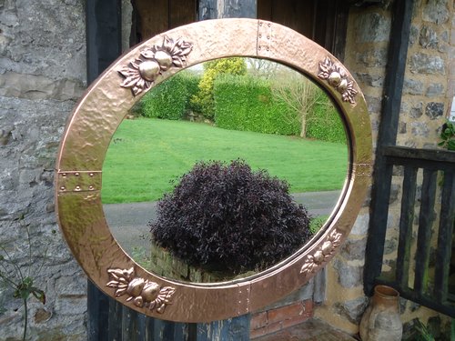 Arts & Crafts oval copper mirror
