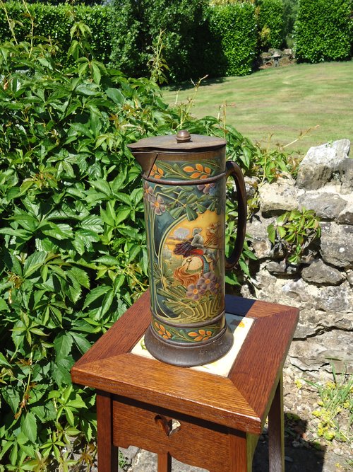 Arts & Crafts painted tin jug with lid