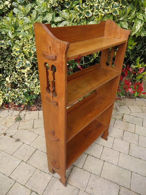 Arts & Crafts pegged oak bookshelves with tulips