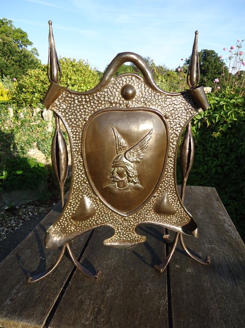 Arts & Crafts viking copper firescreen