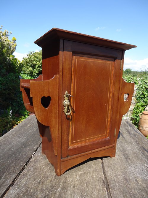 Arts & Crafts wall cupboard. Shapland & Petter