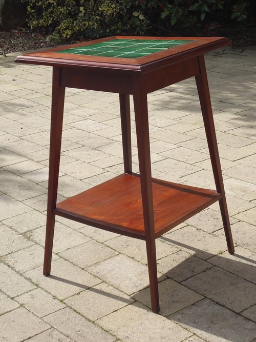 Arts & Crafts tiled top table in walnut