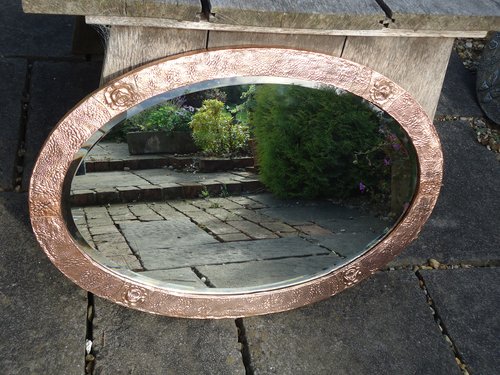 Large Arts & Crafts Oval copper mirror with roses