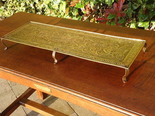 Large Arts & Crafts brass trivet, Keswick