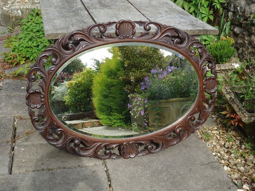 Large Arts & Crafts carved oak mirror