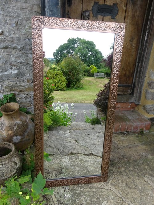 Large Arts & Crafts copper mirror. Overmantle