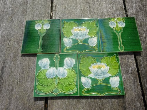 Lovely set of five Arts & Crafts floral tiles