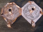 Matched pair Arts & Crafts candleholders.
