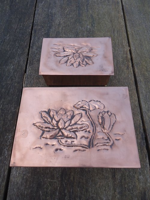 Pair of Arts & Crafts copper caskets