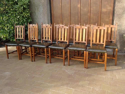 Set of 12 Arts & Crafts oak chairs for Liberty
