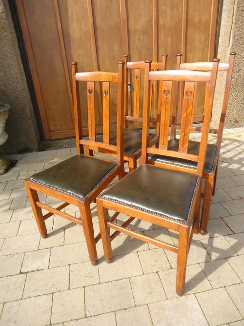 Set of Four oak Arts & Crafts dining chairs