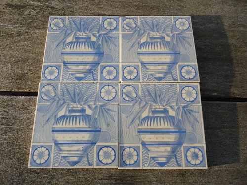 Set of four Arts & Crafts tiles - Dresser?