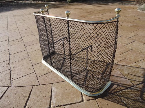 Small Victorian brass and wire fire guard