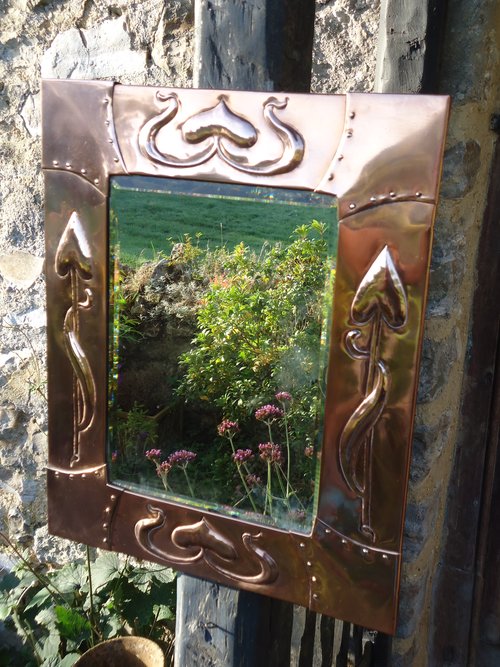 Stunning Arts & Crafts copper mirror with spades