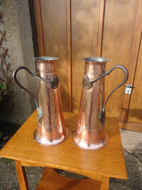 Stunning pair of large Arts & Crafts copper jugs