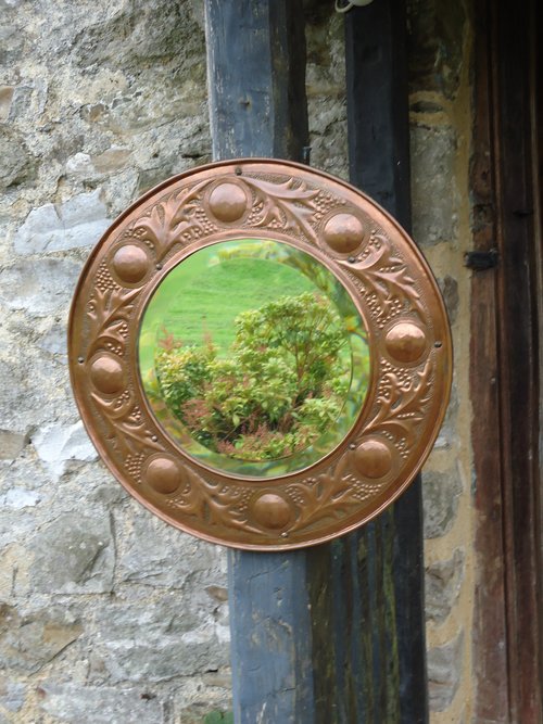 Superb Arts & Crafts Keswick copper mirror