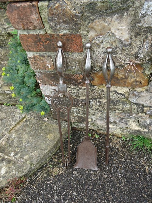 Superb set of Arts & Crafts Steel Fire Irons