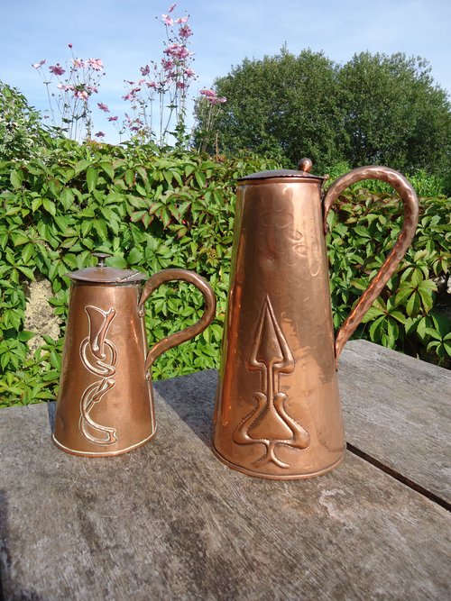 Two decorative Arts & Crafts jugs Pool of Hayle