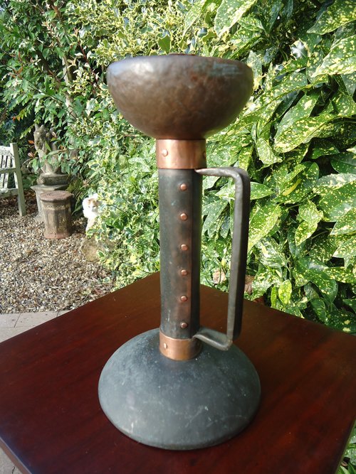 Unusual Arts & Crafts copper candle holder