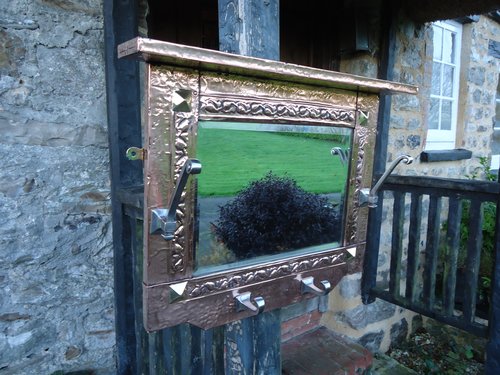 Unusual Arts & Crafts copper hall mirror