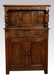 carved oak court cupboard