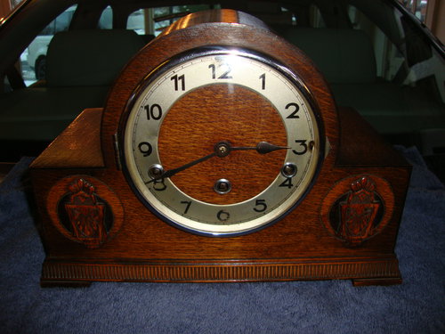 Circa 1938 Oak Art-Deco mantle clock.