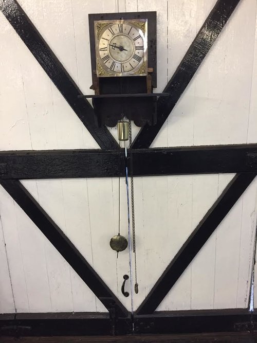 Hooded 8 day wall clock by John Dumville. c1730.