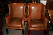 Pair of Leather Wing Armchairs