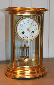 Oval four glass mantel clock F