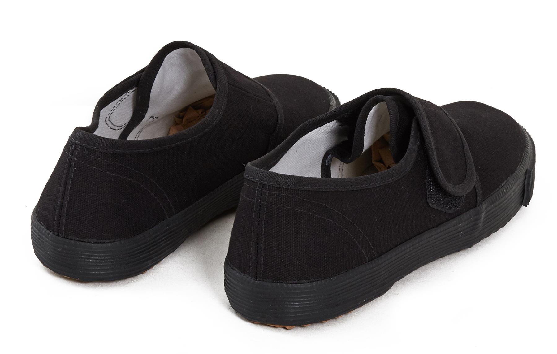 girls black pe trainers