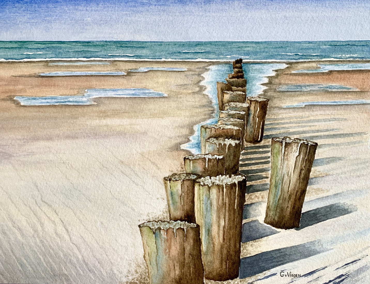 Strand met paalhoofden