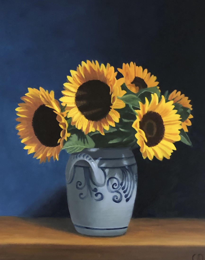 Zonnebloemen in keulse kan