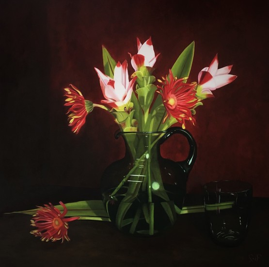 Bloemen in groen glas