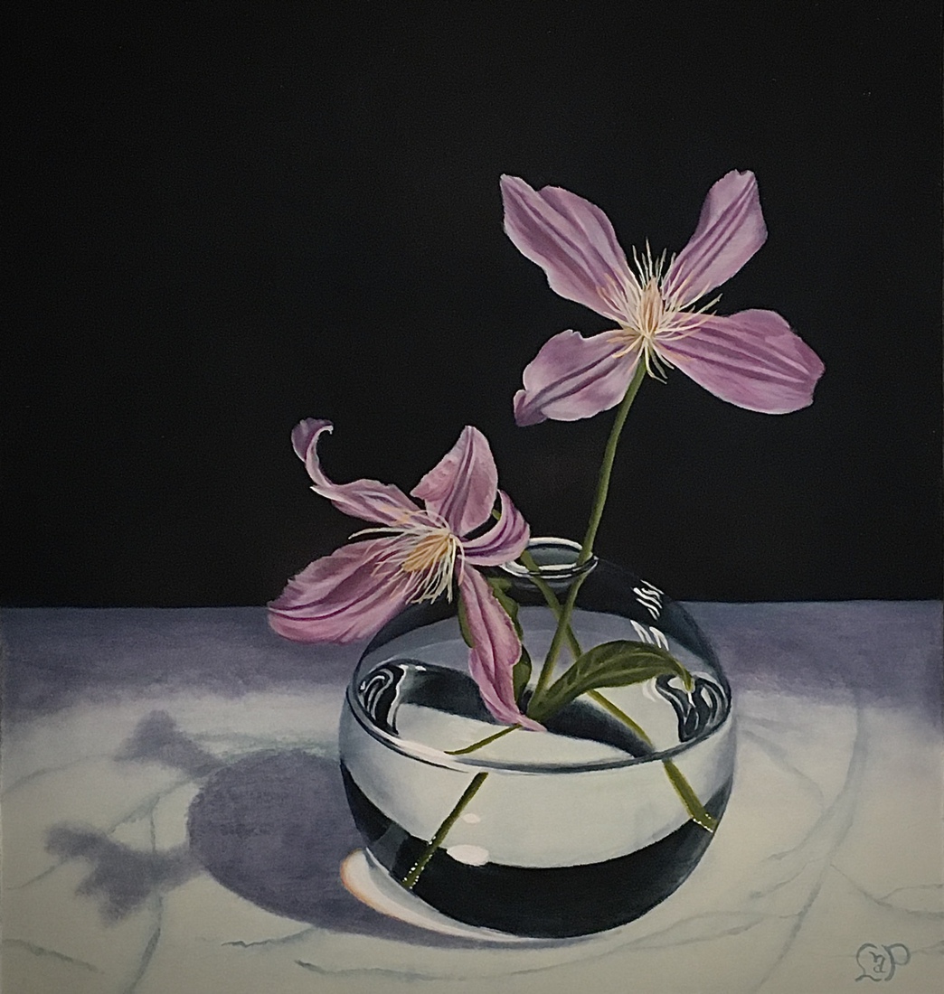 Clematis in glazen bolletje