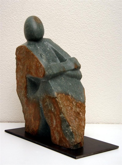 Zittende figuur