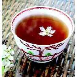 Taza de té rojo