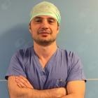 Dr. Enis Rustemi