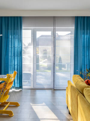 Rolety rzymskie z zasłonami