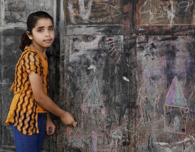 Fatima* lost her brother during the conflict. Fatima has been attending individual counselling and group therapy sessions through a Save the Children project. Her mother says these have helped Fatima to be able to cope with the changes in their lives. Photo: Anas Baba/Save the Children