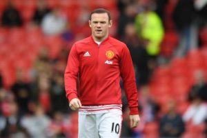 Man U captain Wayne Rooney has been dropped to the bench for the visit of Premier League champions Leicester to Old Trafford on Saturday. / AFP PHOTO / ANTHONY DEVLIN /