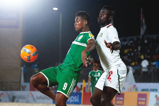 Action in the match between Nigeria and Ghana at the 2016 CAF Beach Soccer Cup of Nations in Lagos. Photo: Beachsoccer.com