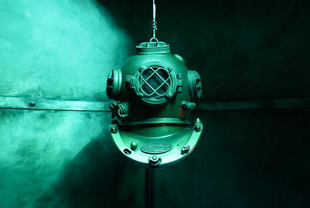 old diving helmet underwater